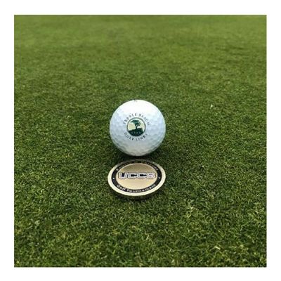 a golf ball on the green