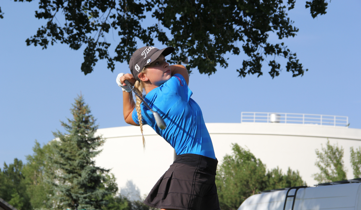 Image of UCCS PGA Golf Management student mid-swing