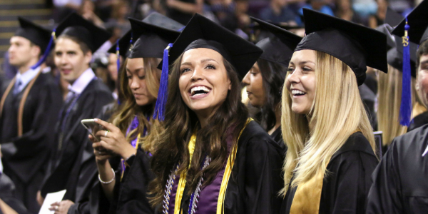 Photo of the individuals at graduation