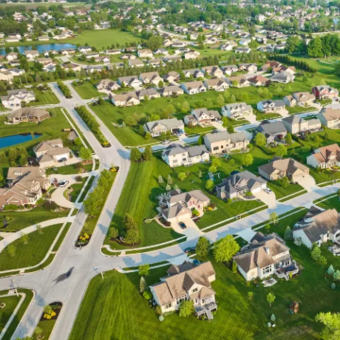 Aerial view of houses and neighborhood.