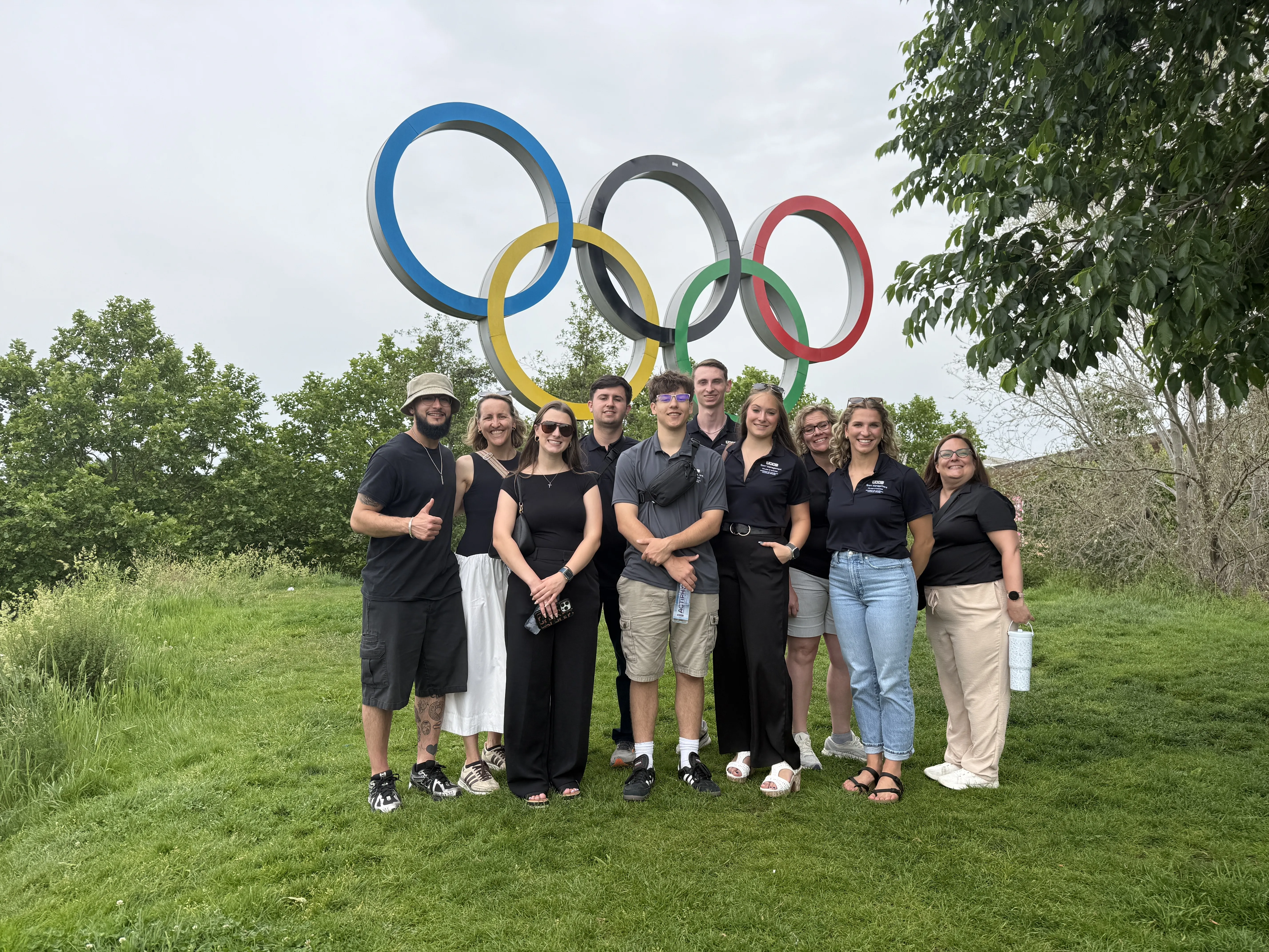 People in front of the London Olympic Rings 