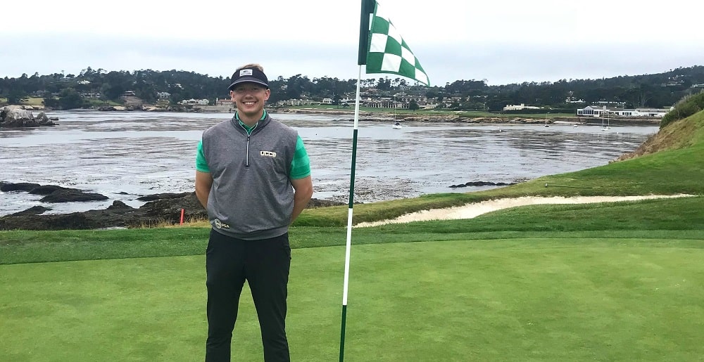 Justin Sturdy with golf flag